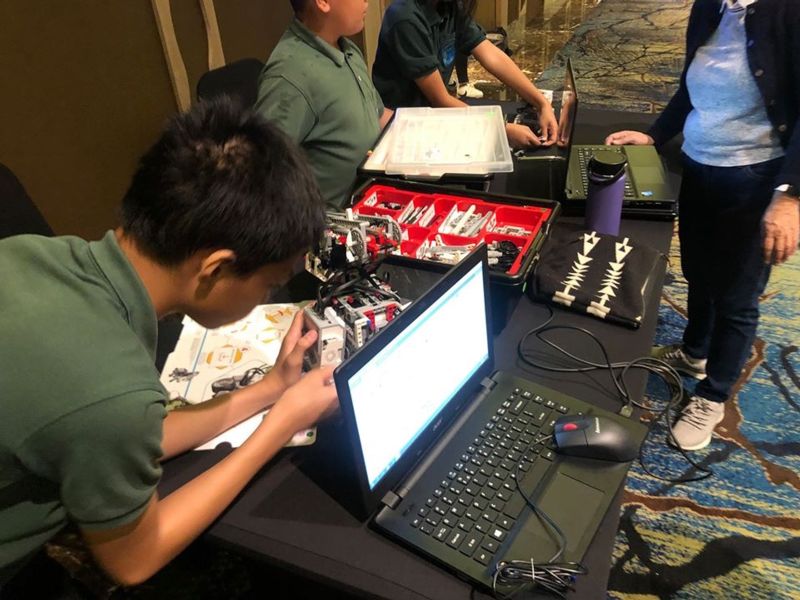 Students program robots at the TCEA competition.